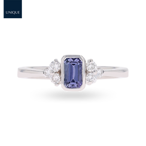 18ct White Gold Emerald Cut Tanzanite Solitaire with Diamond Set Shoulders Ring