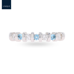 9ct White Gold Blue Topaz & 0.23cts Diamond Bar Set Eternity Ring