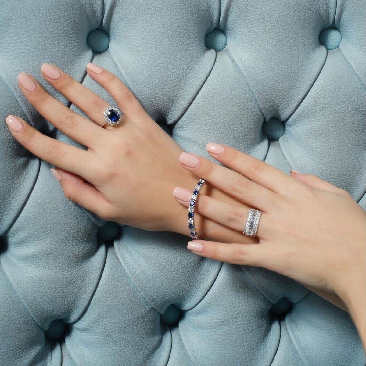 Model hand wearing Model hand wearing Sterling Silver Blue Cubic Zirconia Cluster Ring