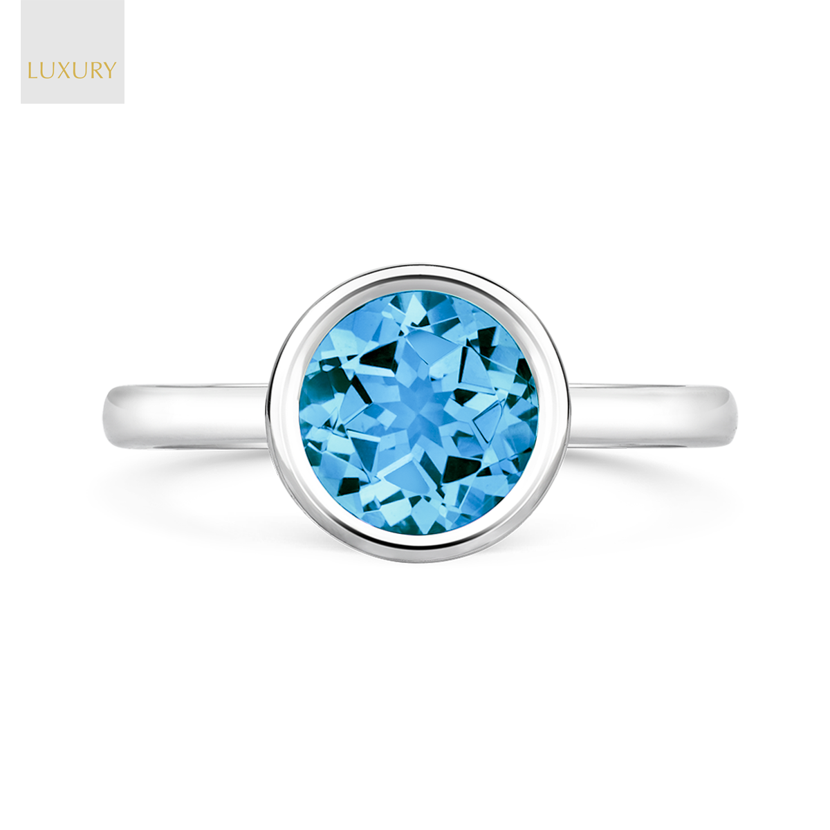 18ct White Gold Blue Topaz Bezel Set Solitaire Ring